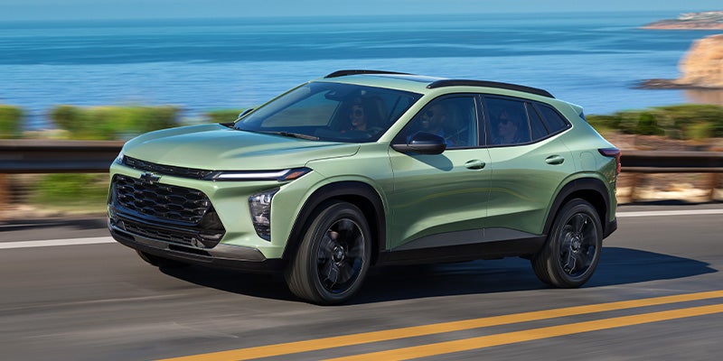 green Chevy Trax on road